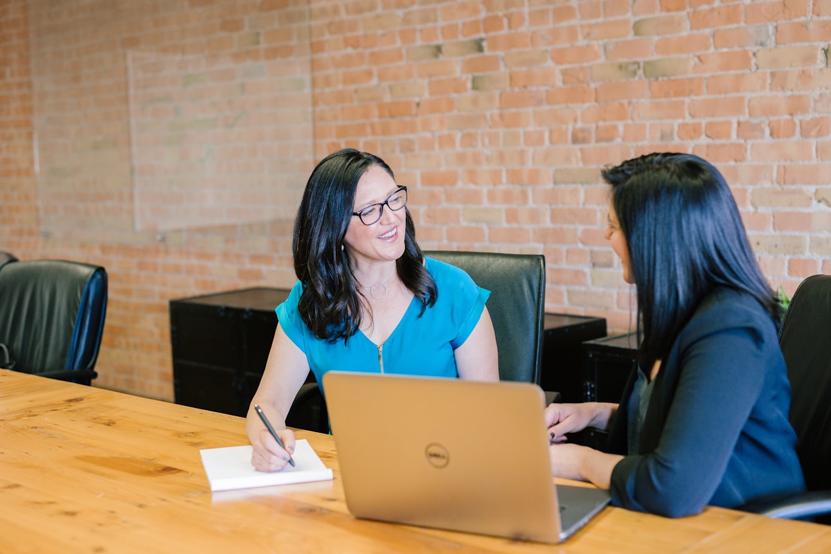 Two people reviewing financial choices together
