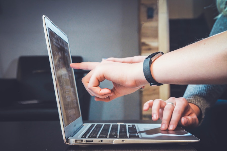 Person using laptop for online research